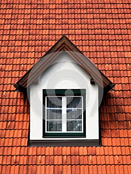 Spross Gaube roof window in a red roof