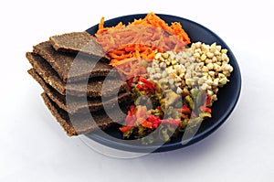 Sprouted buckwheat, flax breads, pepper and carrot