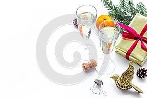 Spruce, mandarin, champagne, present and toys for christmas celebration on white background mockup