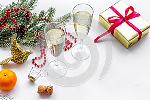 Spruce, mandarin, champagne, present and toys for christmas celebration on white background mockup