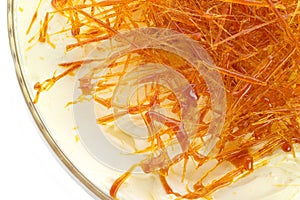 Spun caramelised sugar topped orange trifle dessert photo