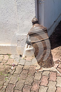 Spur stone of a building made of an old cannon in Cayenne, capital of French Guian