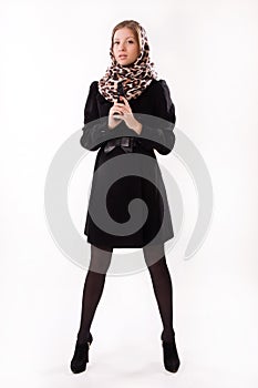 Spy girl in a black with gun