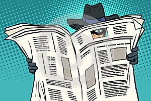 Spy watches through the newspaper