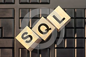 Sql - structured query language - letter pices on the wooden blocks