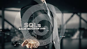 SQLs-Sales Qualified Lead with hologram businessman concept