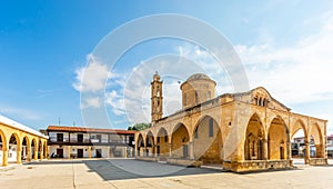 Square with Agios Mamas church with bell tower, Guzelyurt, Morphou,  North Cyprus