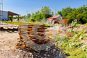 Square armature rods on the ground of building site