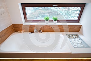 Square bathtub with simple tap