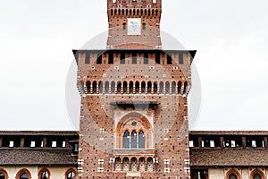 Square brick tower of Castello Sforzesco. Milan, Italy
