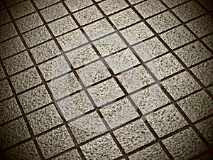 Square bricks in grey with pinhole camera effect