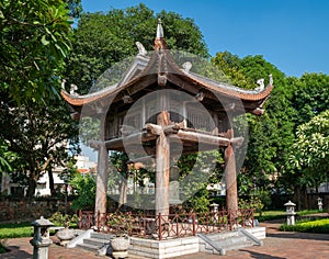 Square building holding a big bell on side of Imperial Academy in Temple of Literature Van Mieu, the first national university