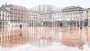 Square of burgos raining and snowing