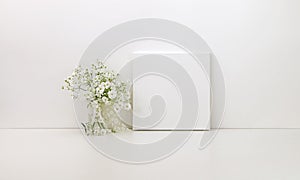 Square canvas mockup, white flowers photo