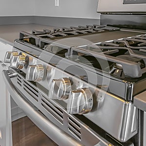 Square Close up of the cooktop and oven of a range inside a modern kitchen