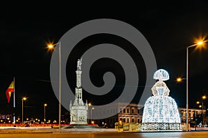Square of Colon in Madrid with Menina of Velazquez figure lluminated at Christmas photo