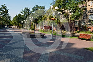 Square with colored tiles and benches