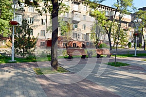 Square with colored tiles and benches