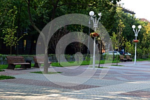 Square with colored tiles and benches