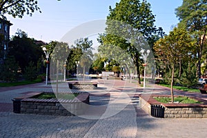 Square with colored tiles and benches