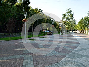 Square with colored tiles and benches