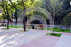 Square with colored tiles and benches