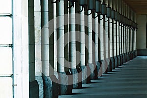 Square columns stand in a row. Architecture