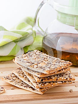 Square crackers with flax, sesame and sunflower seeds