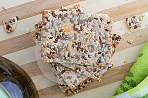 Square crackers with flax, sesame and sunflower seeds