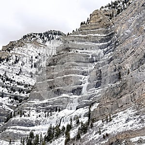 Square crop Bridal Veil Falls in Provo Canyon with water on steep slopes frozen in winter