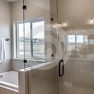 Square crop Frameless walk in shower stall and built in bathtub inside tile wall bathroom