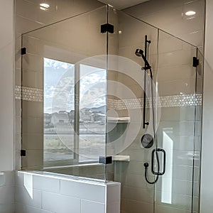 Square crop Rectangular walk in shower stall with half glass enclosure and black shower head