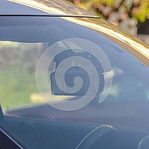 Square crop Windshield of sheriffs car with dashboard camera photo