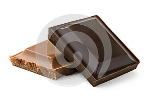 Square of dark chocolate resting on a square of milk chocolate isolated on white. Rough edges