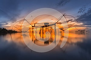 Square dip net catch fish at sunrise,Pakpra,Phatthalung, Thailan