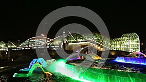 Square of Europe, Animated fountain and bridge Bogdan Khmelnitsky lit at night, Moscow, Russia