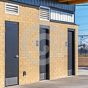 Square Exterior of the public restrooms at a park viewed on a sunny day