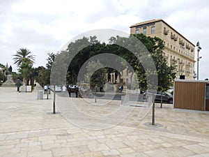 Square at the Fountain of Tritons near the city gates of Valletta, Malta.