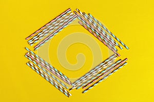 Square Frame from bright multicolor paper drinking straws with Gold striped