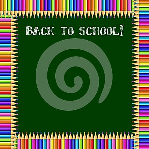 Square frame made of colorful pencils on green blackboard background with back to school chalky inscription and copy space.