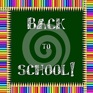 Square frame made of colorful pencils on green blackboard background with back to school chalky inscription inside.