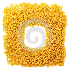 Square frame made of dry ditalini pasta over isolated white background