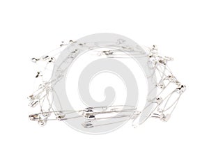 Square frame made of safety pins isolated on white