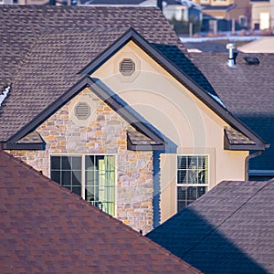 Square frame Roofs and gables of American houses in winter