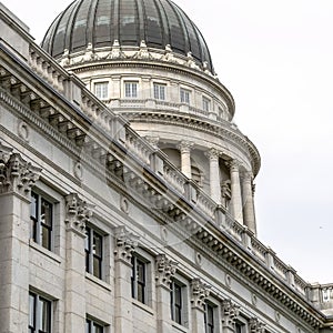 Square frame Utah State Capital building exterior with classical architecture and dome