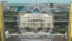 A square in front of Ak Orda with Altyn Orda business center in the foreground timelapse. Nur-Sultan city, Kazakhstan