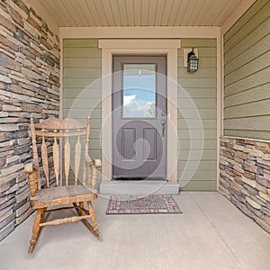 Square Front porch of modern house with rocking chair