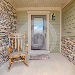 Square Front porch of modern house with rocking chair photo