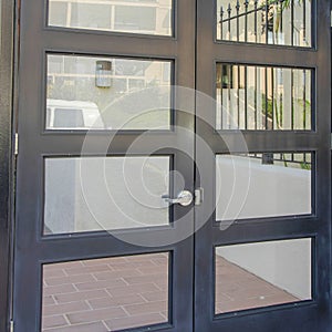 Square Hinged double door gate with glass panel at La Jolla, California