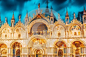 Square of the Holy Mark Piazza San Marco and St. Mark`s Cathedral Basilica di San Marco at the night time. Venice, Italy